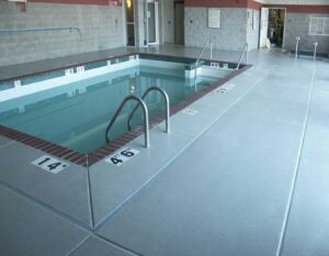 Decorative quartz floor coating in pool area