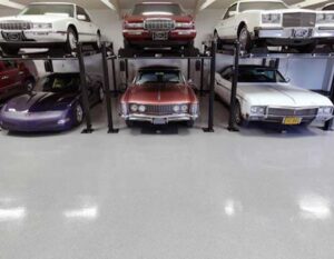 Showroom floor of classic cars with granite flooring