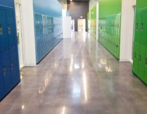 Picture of school hallway with lockers and concrete floor